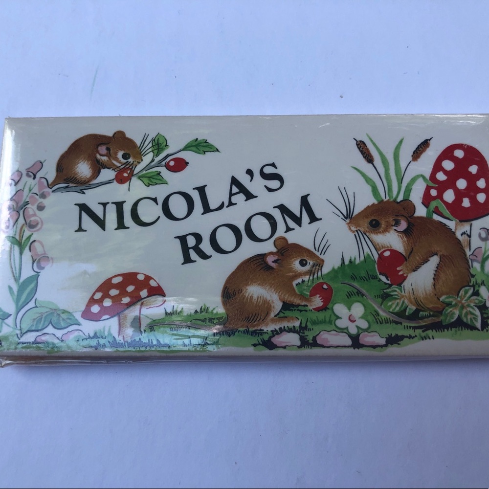 Ceramic room name plate.